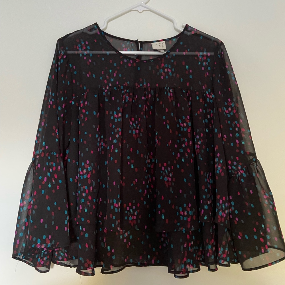 Semi sheer blouse